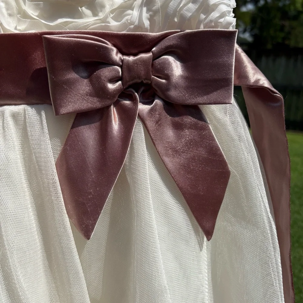 Rare Editions off white with taupe colored sash Size 4 Good used condition